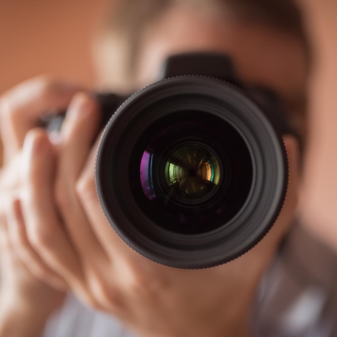 Photgrapher behind camera