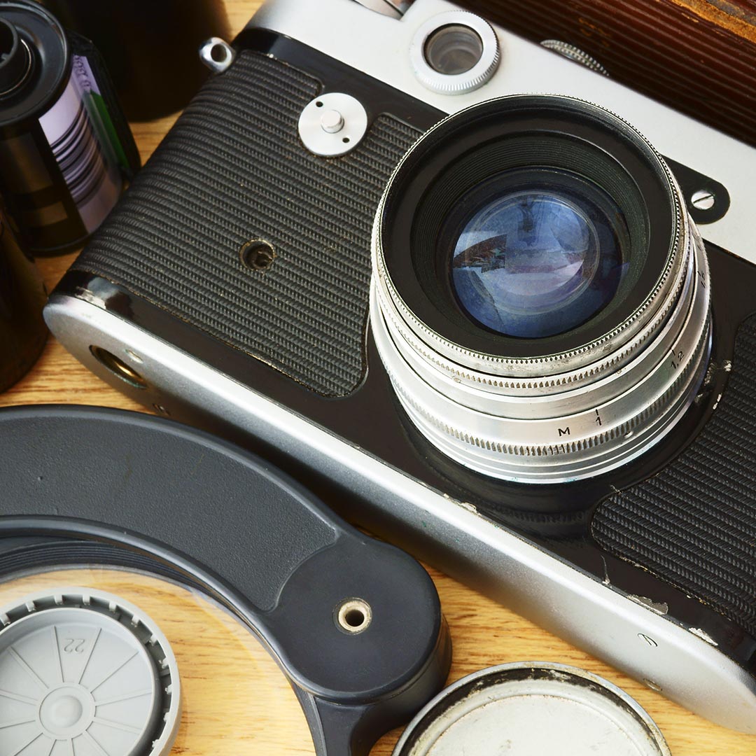 Camera and film on table